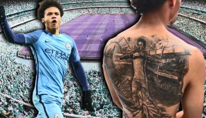 Leroy Sane hat sich Leroy Sane auf den Rücken nageln lassen. Eine Frage: Der dunkle Brustring auf dem Tattoo-Trikot... bereitet er womöglich einen Wechsel zum VfB Stuttgart vor?