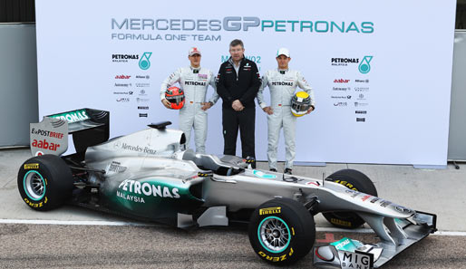 Ross Brawn (M.) wird seine Anteile wohl an Mercedes abgeben