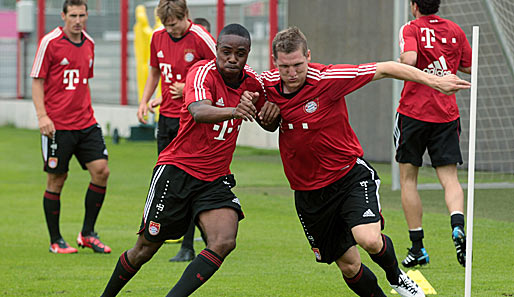 Die WM-Fahrer Edson Braafheid (l.) und Bastian Schweinsteiger im direkten Duell