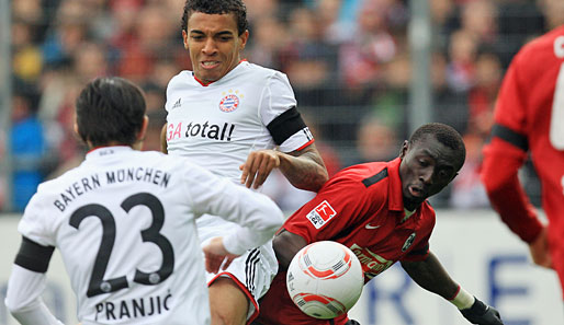 Bald vereint beim FC Bayern? Papiss Demba Cisse (r.) im Duell mit Luiz Gustavo