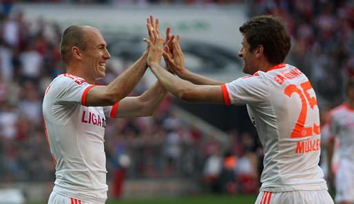 Wie lange Arjen Robben (l.) noch mit Thomas Müller jubeln kann, ist unklar