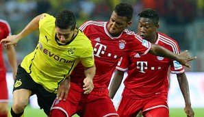 Robert Lewandowski (l.) im Duell mit Jerome Boateng und David Alaba