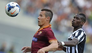 Taddei (l.) spielt bereits seit 2005 bei der Roma