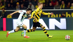 DFB-Teammanager Oliver Bierhoff kann sich Marco Reus (r.) weiter beim BVB vorstellen