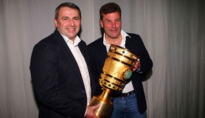 Das ist das Ding! Manager Allofs und Trainer Hecking holten ihren ersten gemeinsamen Titel