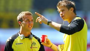 Mitch Langerak (r.) zusammen mit Mario Götze.