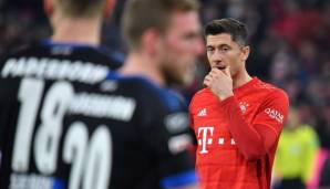 Robert Lewandowski (r.) tritt mit den Bayern heute bei Arminia Bielefeld an - leider ohne Zuschauer.