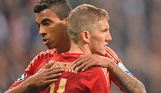 Luiz Gustavo (l.) und Bastian Schweinsteiger gehen vorbelastet in Barcelona-Spiel