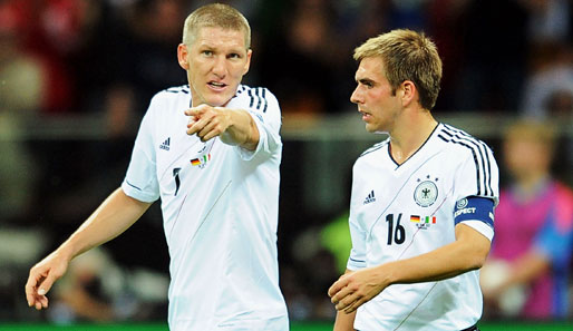 Bastian Schweinsteiger (l.) und Philipp Lahm müssen sich Kritik von Günter Netzer gefallen lassen