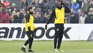 Usain Bolt (r.) ist überzeugt von der großen Qualität von Mario Götze.