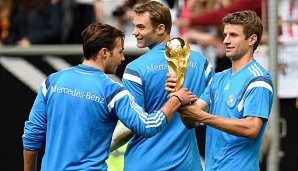 Mario Götze, Manuel Neuer und Thomas Müller hoffen auf eine weitere Trophäe