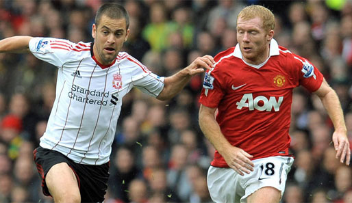 Liverpools Joe Cole (l.) und ManUtd-Spieler Paul Scholes sehen sich im FA-Cup wieder