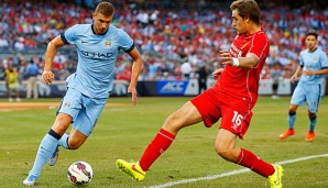 Edin Dzeko (l.) spielt seit 2011 für Manchester City