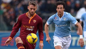 Stefano Mauri (r.) bleibt bei Lazio