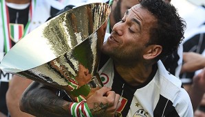 Dani Alves kann mit Juve das Triple gewinnen, was ihm bereits einmal mit Barcelona gelang