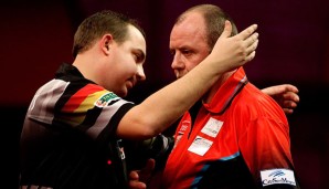 Kim Huybrechts (l.) tröstete seinen Bruder Kim nach ihrem Erstrundenmatch