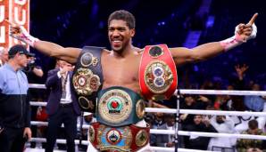 Anthony Joshua, der dreifache Champion mit den Gürteln der Weltverbände WBA, IBF und WBO.