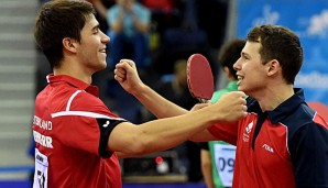 Patrick Franziska und Jonathan Groth jubeln über ihr Doppel-Gold