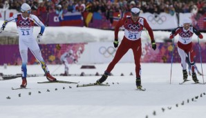 Für Dario Cologna (M.) war es der zweite Olympisieg seiner Karriere.