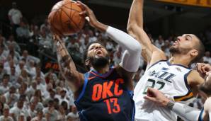 Paul George wird von Rudy Gobert attackiert.