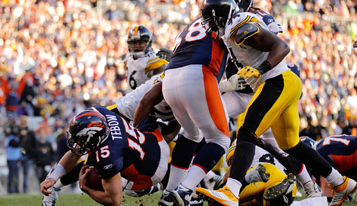 TOUCHDOWN! Tim Tebow (l.) führte die Broncos zum Sieg über Pittsburgh