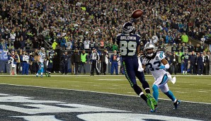 Doug Baldwin (l.) schnappt sich den Touchdown, Safety Tre Boston zu spät