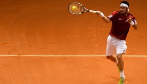 SAO PAULO, BRAZIL - SEPTEMBER 13: David Marrero of Spain returns a shot during his play-off doubles match against Bruno Soares and Marcelo Melo of Brazil on Day Two of the Davis Cup at Ibirapuera Gymnasium on September 13, 2014 in Sao Paulo, Brazil....