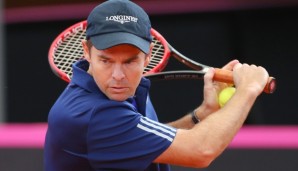 BRISBANE, AUSTRALIA - MAY 11: Todd Woodbridge plays a backhand during the Australian Launch of the Longines Future Tennis Aces Tournament at Queensland Tennis Centre on May 11, 2016 in Brisbane, Australia. (Photo by Chris Hyde/Getty Images)